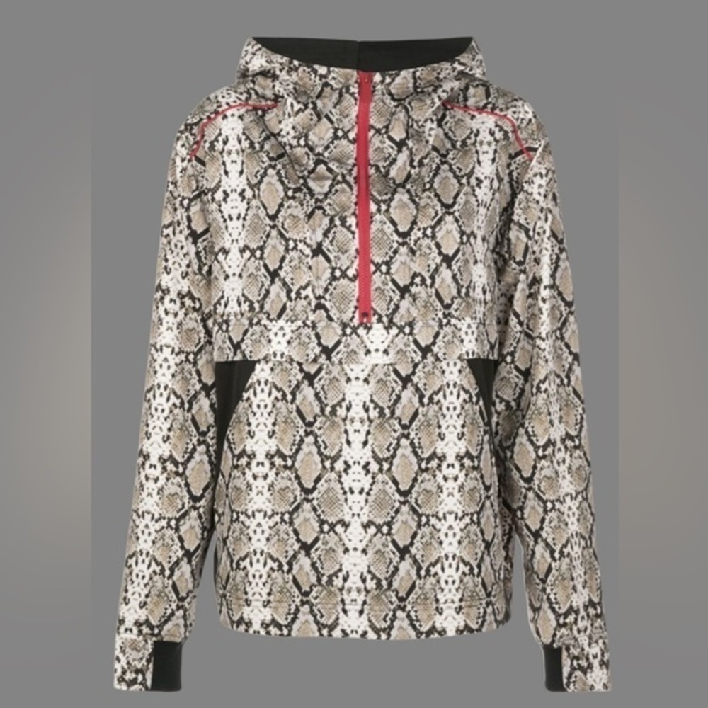 ALALA snakeskin anorak with red accents
